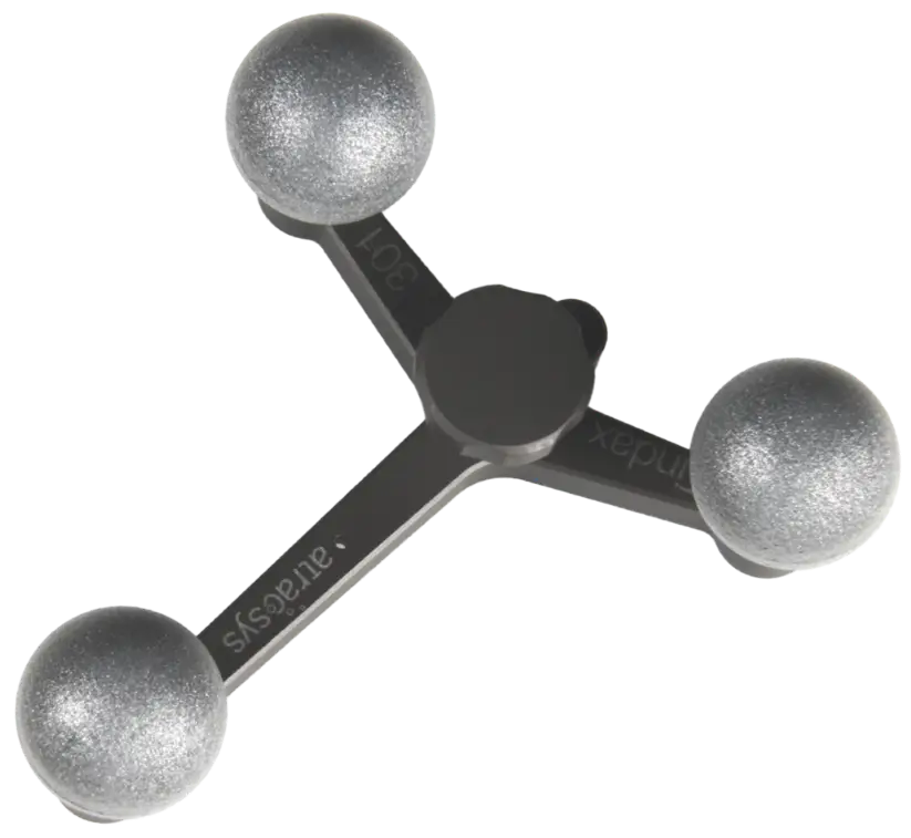 A three-armed metallic fidget spinner with spherical fiducials at each end, each arm labeled rotate, anaxisys, and index. The central hub connects all arms.