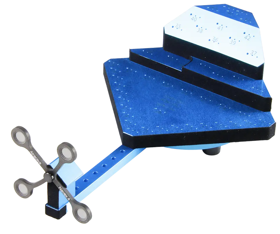 A blue and black, multi-level bird perch with numbered steps and an attached spinner with four circular weights on a stand, used for bird training or agility exercises.